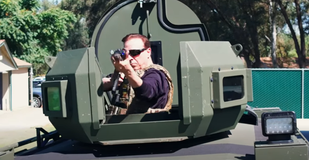 Fresno County Board Chair Garry Bredefeld points what appears to be a semi-automatic firearm in a promotion video for the State of the County event hosted with the Fresno Chamber of Commerce.